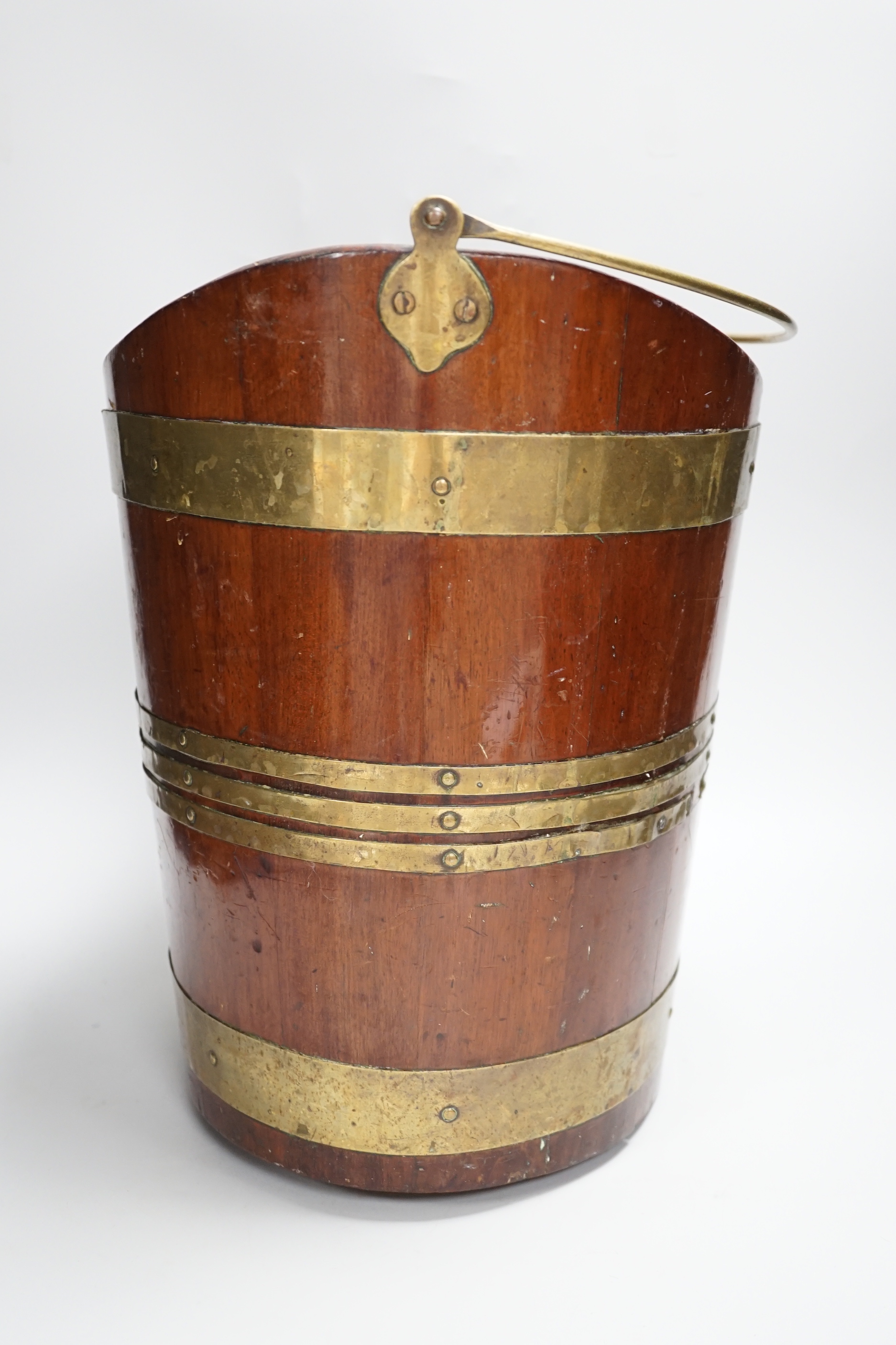 A late 18th century Dutch brass bound mahogany oyster bucket, 35cm tall